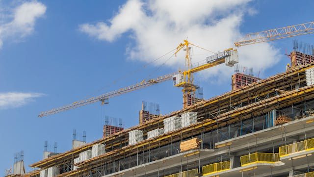 Modern construction site with tower canes