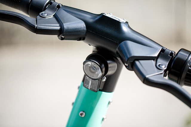 Green electric scooter handlebars