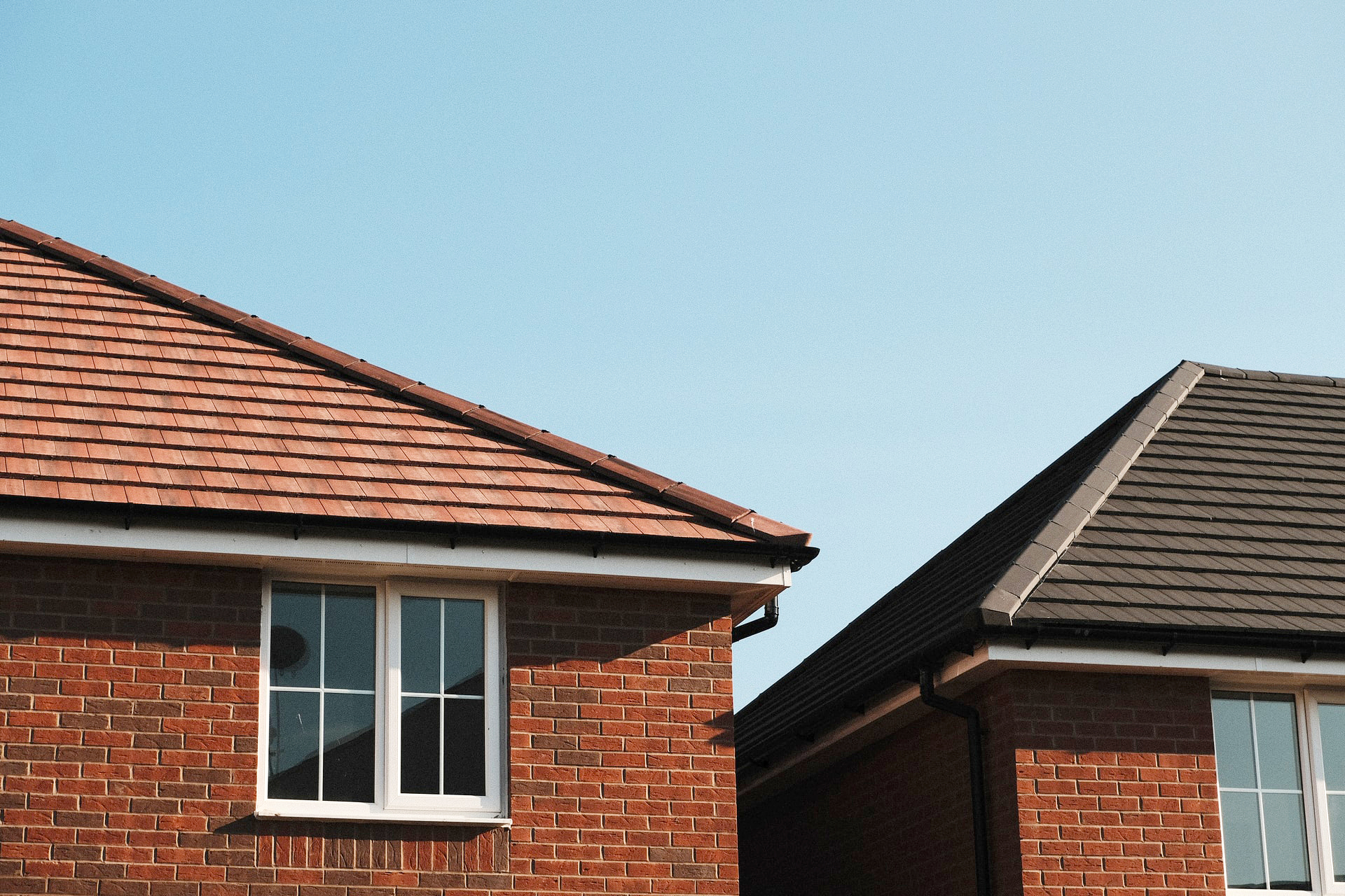 Newly built houses against a blue sky