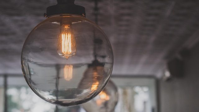 Round clear light fitting on ceiling