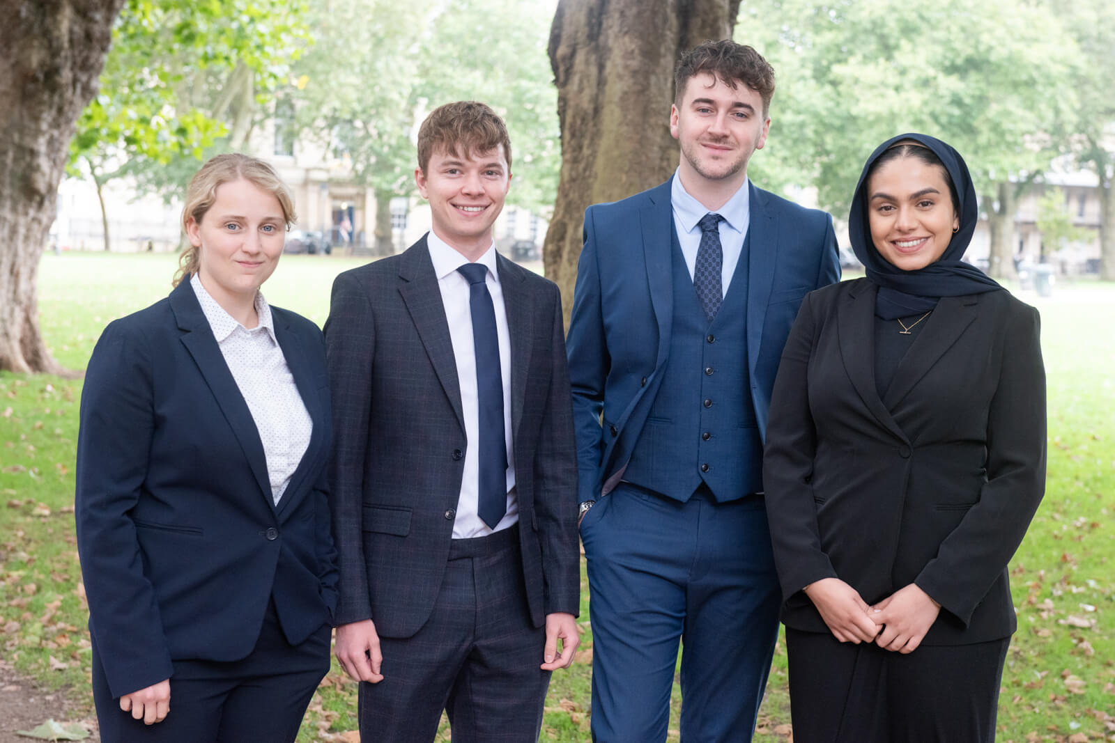 four-trainee-solicitors