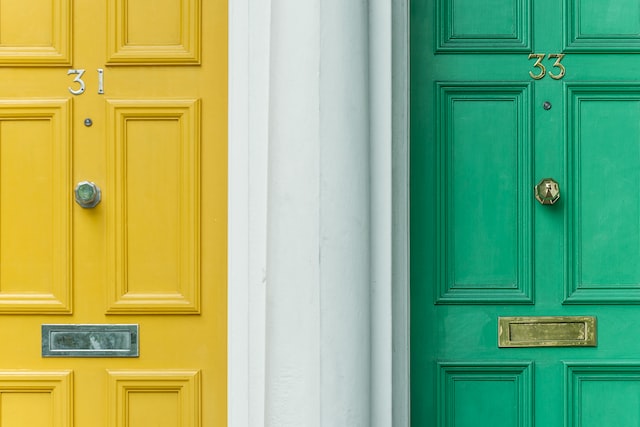 yellow-front-door-next-to-green-front-door