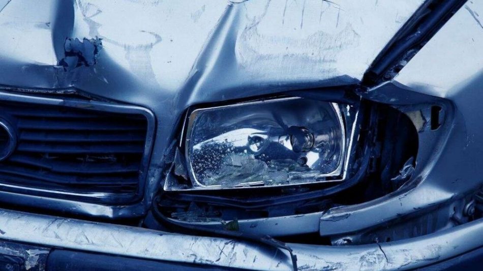 Close up of damaged car headlamp