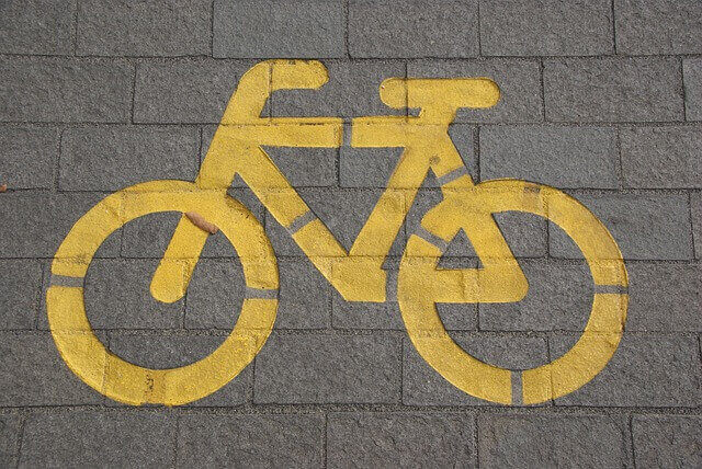 yellow-painted-bike-lane-sign