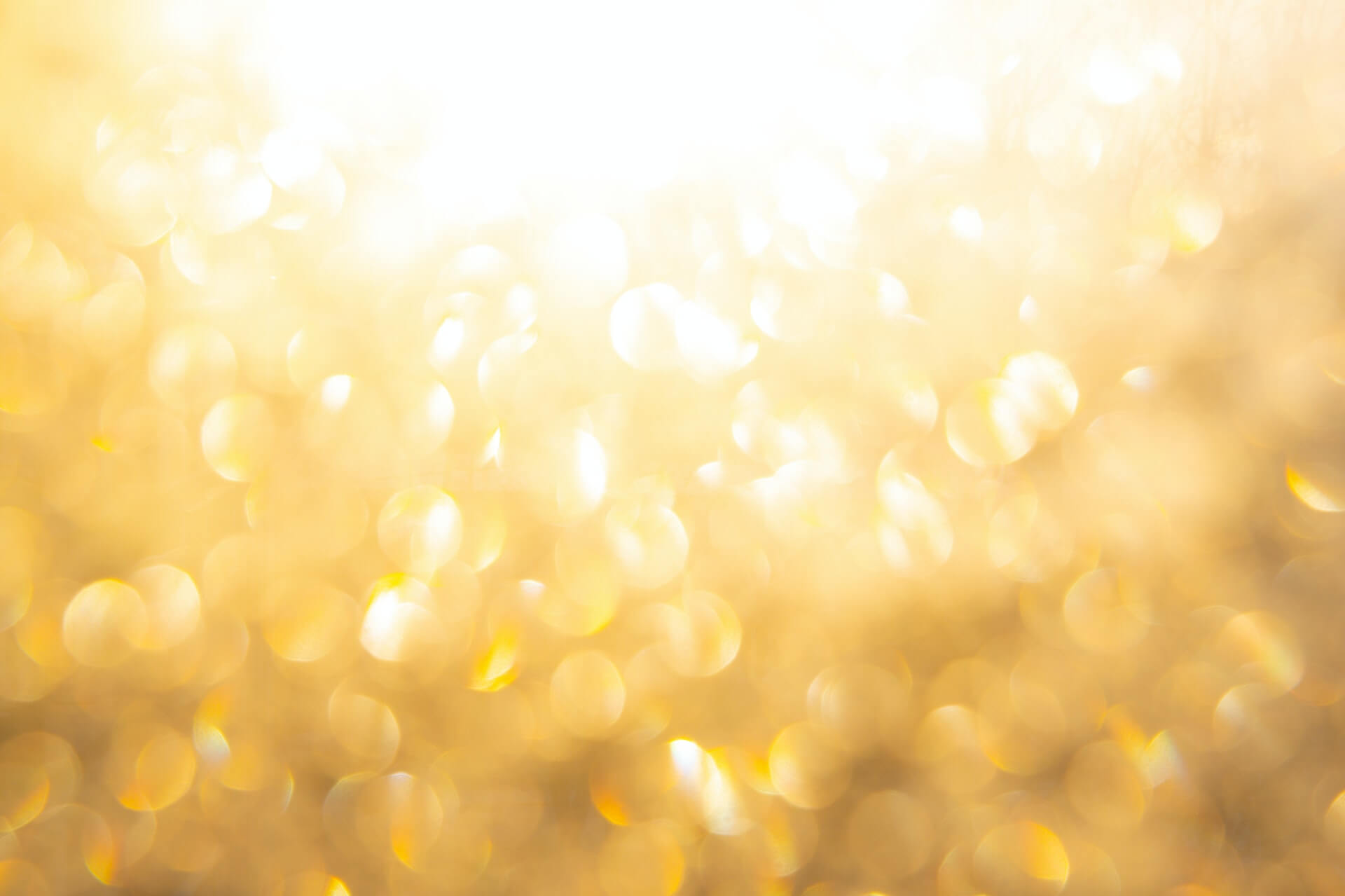 Blurred gold sparkles