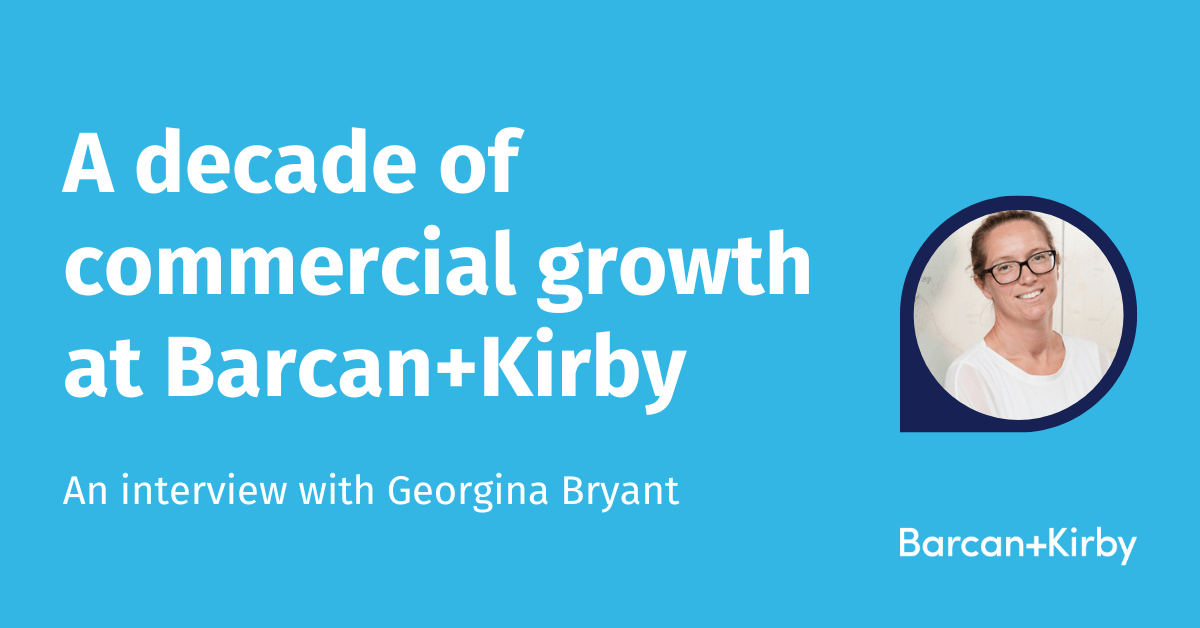 White text on a blue background that says 'A decade of commercial growth at Barcan and Kirby. An interview with Georgina Bryant'