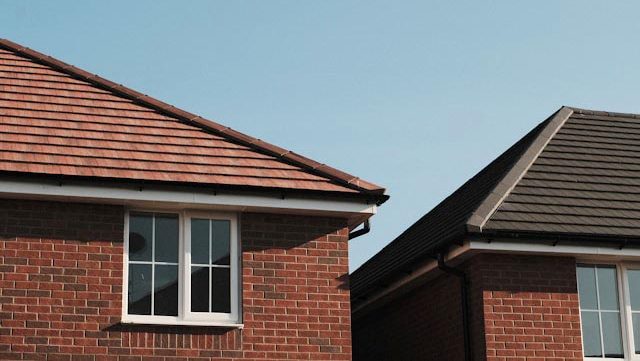 Newly bult houses against a blue sky