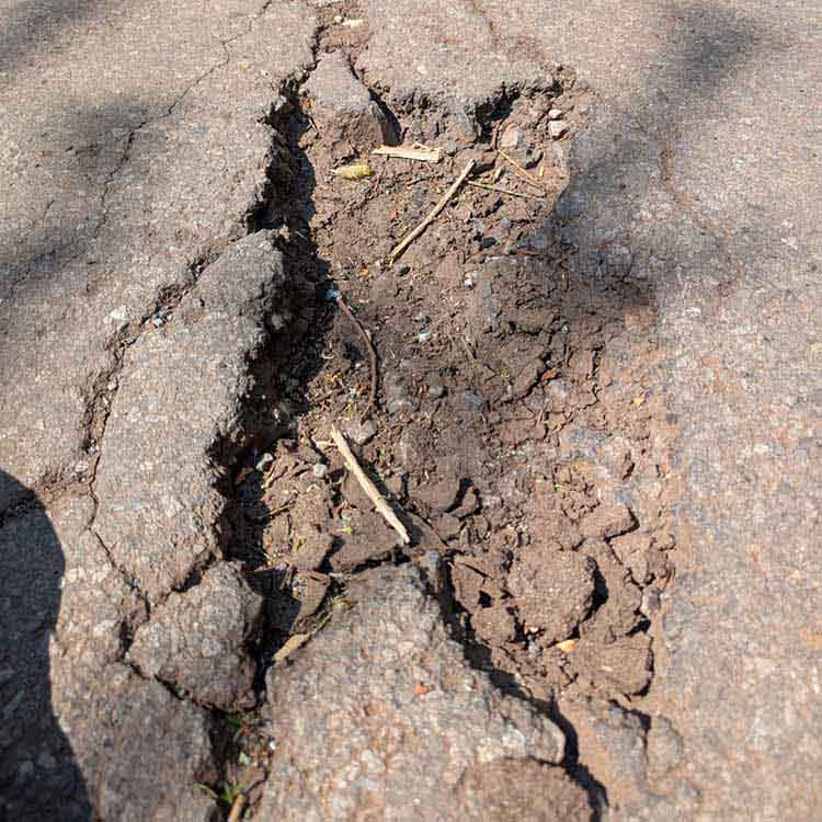 Close up of a pothole on a road